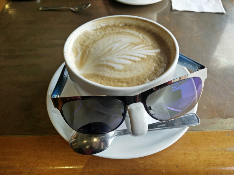 A bowl of coffee the size of a human head